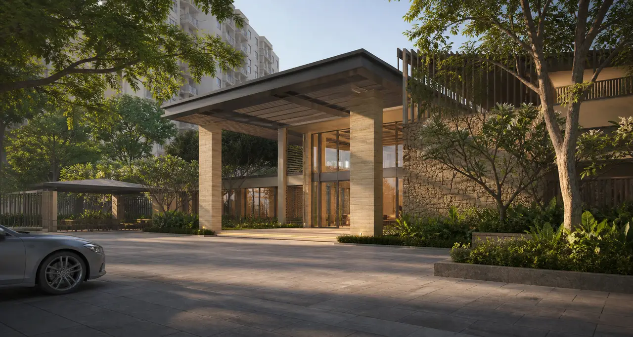 Modern clubhouse arrival court with a deep canopy, warm stone and tropical planting